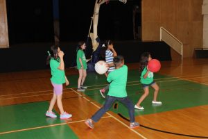 Children play dodge ball at Vacation Bible School in the gym on July 29, 2015. 
